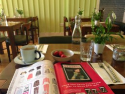 breakfast in a new cafe surrounded by fashion magazines